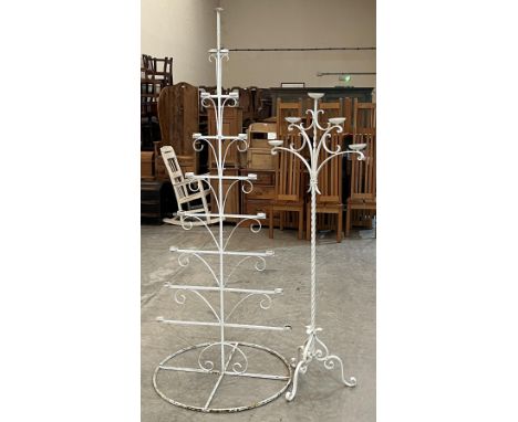 A wrought iron seventeen light standing candelabrum, 80" high and a five light example.