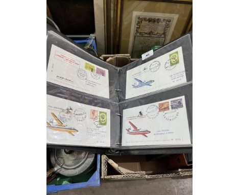 A box of first day covers and stamps.