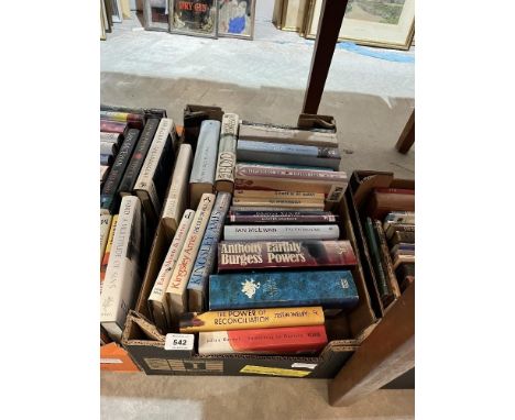 Three boxes of modern first edition books.