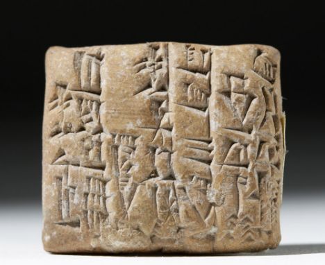 Ancient Near East, Ur, dated to year 2 of King Amar-Suen of Ur III, 2046 to 2038 BCE. A fired clay biscuit tablet carved with