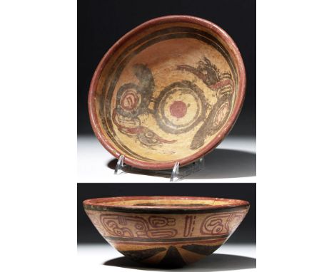 Pre-Columbian, Maya, Classic Period, ca. 700 to 900 CE. A bowl in the classic Copador style, with black and red slip forming 