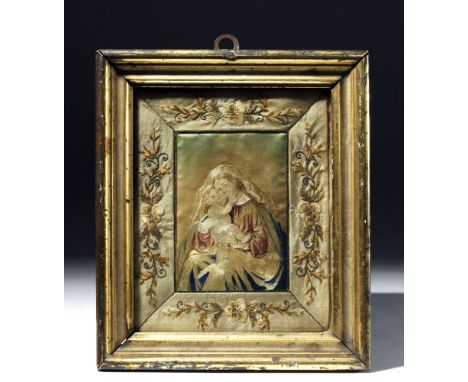 Europe, probably France, ca. 18th to 19th century CE. A beautiful embroidered depiction of Mary and Jesus surrounded by an em