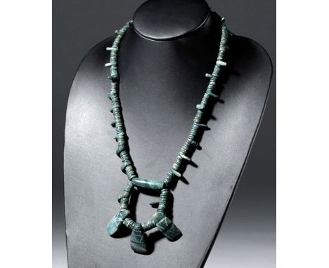 Pre-Columbia, Costa Rica, Pacific Slope, ca. 1 to 500 CE.  A magnificent necklace comprised of deep blue/green jade.  Made fr