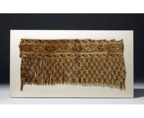 Pre-Columbian, Peru, north coast, Chimu/Inca culture, ca. 800 to 1400 CE.  Woven textile panel with fringed bottom.  Camelid 