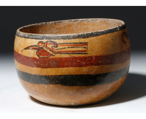 Pre-Columbian, Mayan Territories, Peten region of Guatemala, ca. 550 to 800 CE. A whimsical polychrome pottery vessel featuri