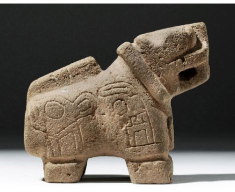 Pre-Columbian, Bolivia, Tiahuanaco (Tiwanaku), Middle Horizon, ca. 800 to 1100 CE. A wonderful basalt carving of a stylized f