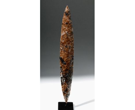 Pre-Columbian, West Mexico, Colima, ca. 300 BCE to 300 CE. A huge and gorgeous mottled red-brown and black stone spear point 