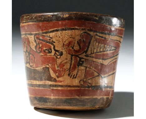 Pre-Columbian, Maya, Classic Period, ca. 700 to 900 CE. A iconographically fascinating small cylinder vessel, perhaps made to