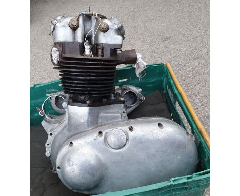 A BSA A7 part engine, c. 1954, numbers erased, refurbished head, barrel and crankcases, no piston or crank.  