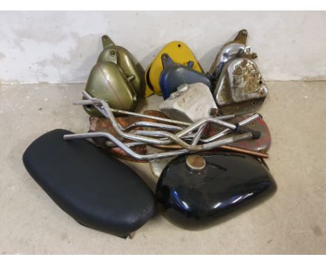 Various oil tanks, tool boxes, mainly AMC and BSA, a petrol tank, a seat and various handlebars.  