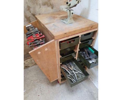 A metal working trolley, with drawers for dollies, files, welding clamps and tools.  