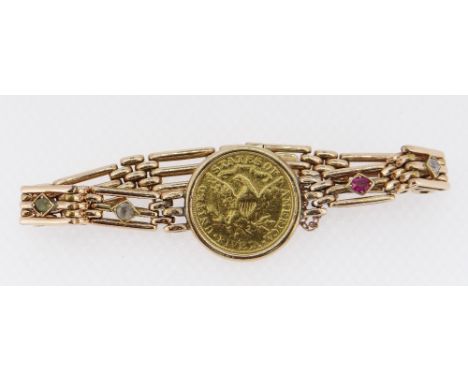 1886 LIBERTY HEAD GOLD FIVE DOLLAR mounted in a 15ct gold gate-link bracelet, four of the links having diamond, ruby and othe