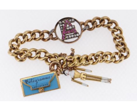 18CT GOLD CABLE LINK BRACELET with centrally mounted diamond and ruby initials 'A E' and two attached charms in the form of a