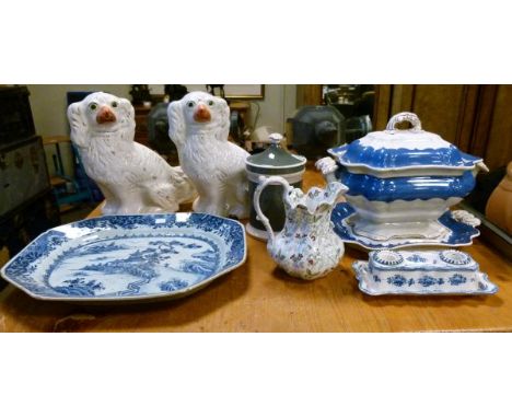 Two Staffordshire comforter spaniels, a blue and white Chinese export meat plate, a pottery tureen cover and stand etc (part 