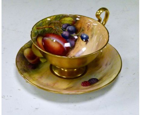 Royal Worcester cabinet cup and saucer, each having painted fruit decoration, the cup by William Hale, the saucer by Hilda Ev