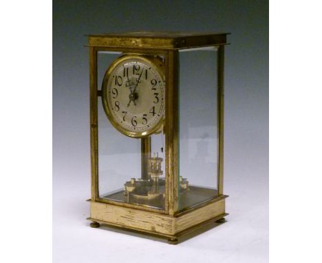 Early 20th Century brass four glass mantel clock, having bevelled panels, silvered dial with Arabic numerals   Condition: 