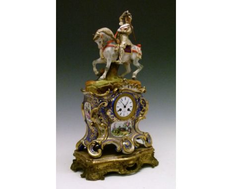 French porcelain mantel clock having polychrome decorated knight in armour on a white horse above a blue and gilt decorated c