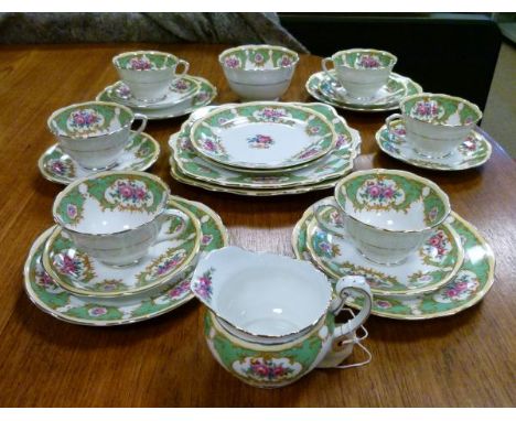 Foley China tea service having foliate decoration on a green and off-white ground   Condition: 