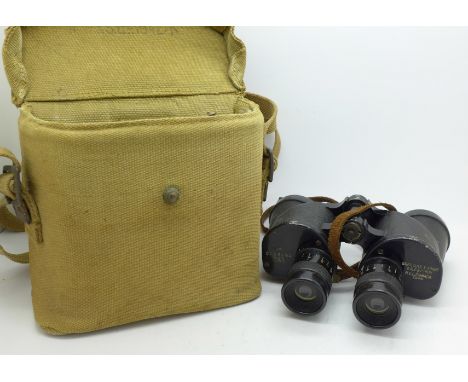 A pair of WWII Canadian binoculars, 6x30, with broad arrow, dated 1944, with canvas case