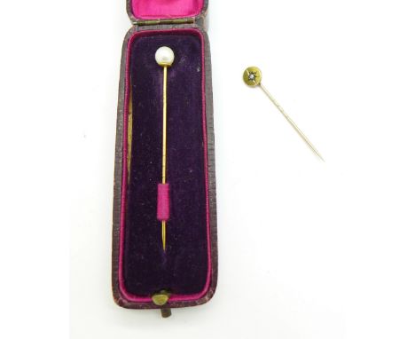 A 15ct gold stick pin and a 9ct gold stick pin