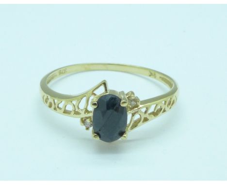 A 9ct gold, sapphire and diamond ring, 1.1g, O