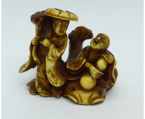 A 19th Century ivory netsuke of Namazu with earthquake fish signed Kaigyokusai Masatsugu