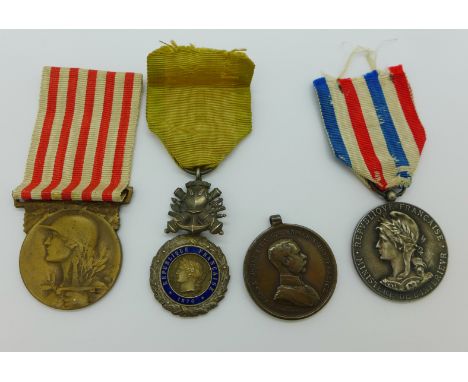 Four medals including a French medal of The Great War, (Grande Guerre), French 1870 Valeur Et Discipline, French Medal of Hon