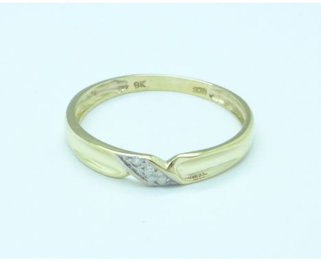 A 9ct gold and diamond ring, 1g, O