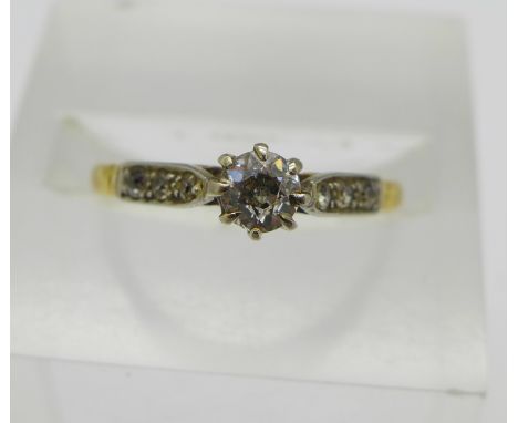 An 18ct gold and diamond solitaire ring, 2g, M