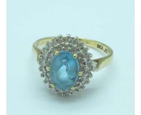 A 9ct gold, diamond and aquamarine ring, 3.3g, N