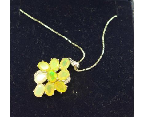 A silver and synthetic fire opal pendant and chain