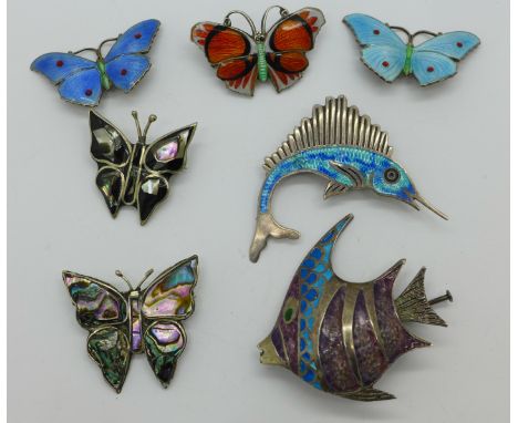 Two silver and blue enamel butterfly brooches by JA&amp;S, an enamelled angel fish, a Mexico silver sword fish and three othe