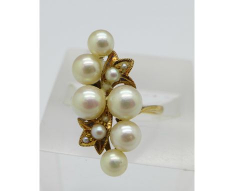 An 18ct gold and pearl ring, 3.8g, M