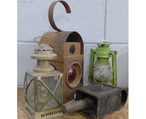 Three lamps and a hurricane lamp