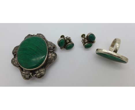 A large silver and malachite set brooch, a ring and a pair of earrings