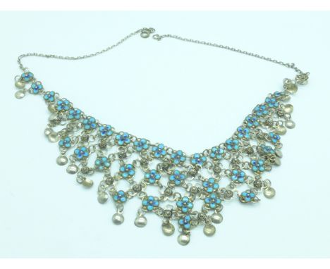 A sterling silver and blue enamel necklet