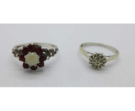 A 9ct white gold and diamond cluster ring, 1.3g, M, and a silver, garnet and opal ring, O (2)