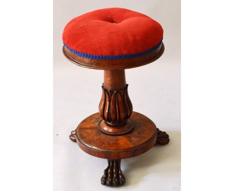 A VICTORIAN MAHOGANY CIRCULAR VELVET TOP PIANO STOOL, fluted column, circular base and claw feet.