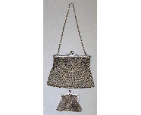 TWO SILVER CHAIN LINK PURSES.