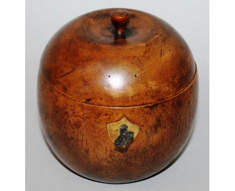 AN APPLE SHAPED TREEN TEA CADDY with lift up lid. 4ins high.