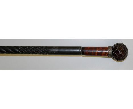 A GOOD 19TH CENTURY EBONY WALKING STICK with amber handle. 37ins long.