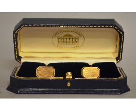 A PAIR OF GENTLEMAN’S 9CT ENGINE TURNED CUFFLINKS in case. Historic House Collection.
