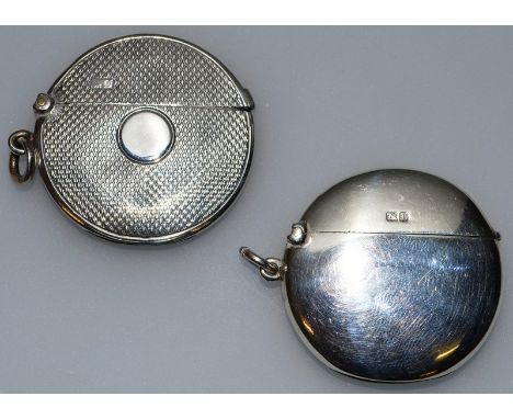 AN EDWARD VII PLAIN CIRCULAR SILVER VESTA, Birmingham 1905, and AN ENGINE TURNED VESTA, Chester 1906 (2).
