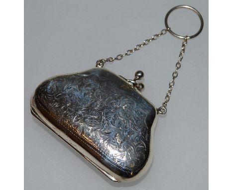 A GEORGE V SILVER ENGRAVED PURSE AND CHAIN. Chester 1922.