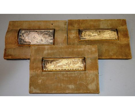A SET OF THREE 18TH CENTURY CARVED STAG HORN  ON BONE STAG HUNTING PLAQUES, 3.25in x 1in (2) and  3in x 1.5in.