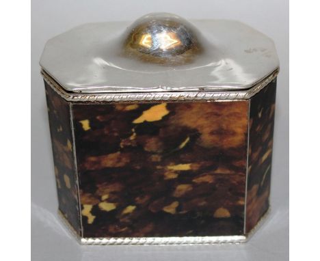 A FAUX TORTOISESHELL AND SILVER PLATE TEA CADDY.