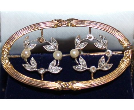 AN EDWARDIAN GOLD DIAMOND AND PEARL BAR BROOCH.