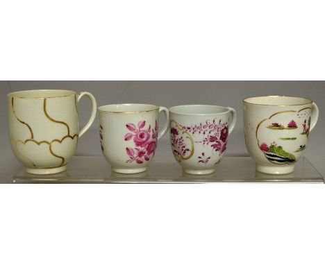 AN 18TH CENTURY WORCESTER COFFEE CUP painted in puce with flowers and a gilt panel, another similar with a large flower spray