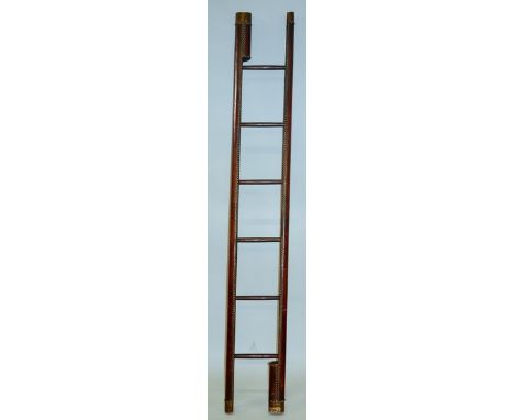 A GOOD RARE GEORGIAN MAHOGANY BRASS AND STUDDED FOLDING LADDER with six rungs. 6ft 7ins high, 1ft wide.