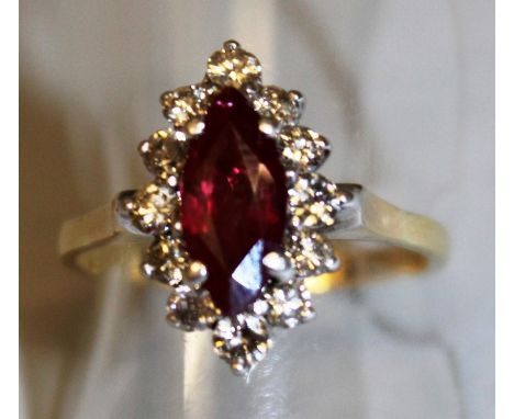 A GOOD RUBY AND DIAMOND MARQUISE RING set in 18ct yellow gold.